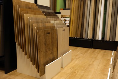 Many different samples of wooden flooring in store