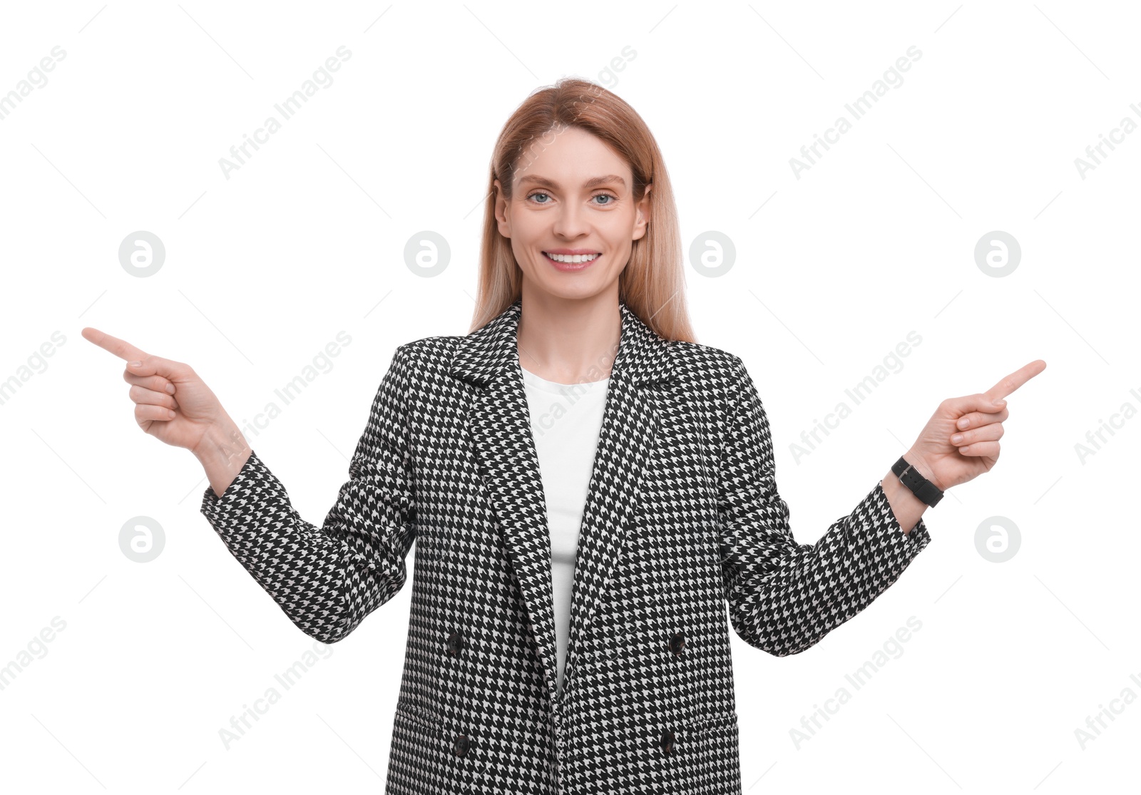 Photo of Beautiful happy businesswoman pointing at something on white background