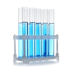 Photo of Test tubes with blue liquid on white background. Laboratory glassware