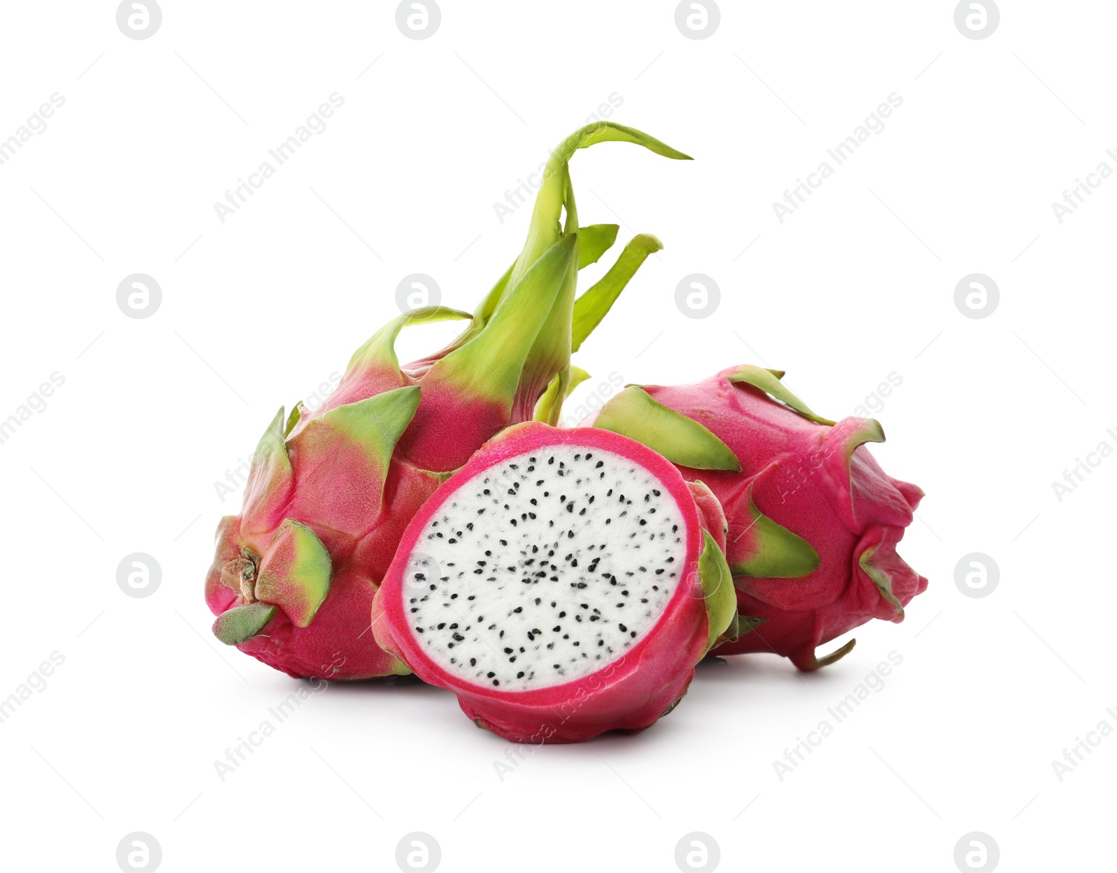 Photo of Delicious cut and whole dragon fruits (pitahaya) on white background