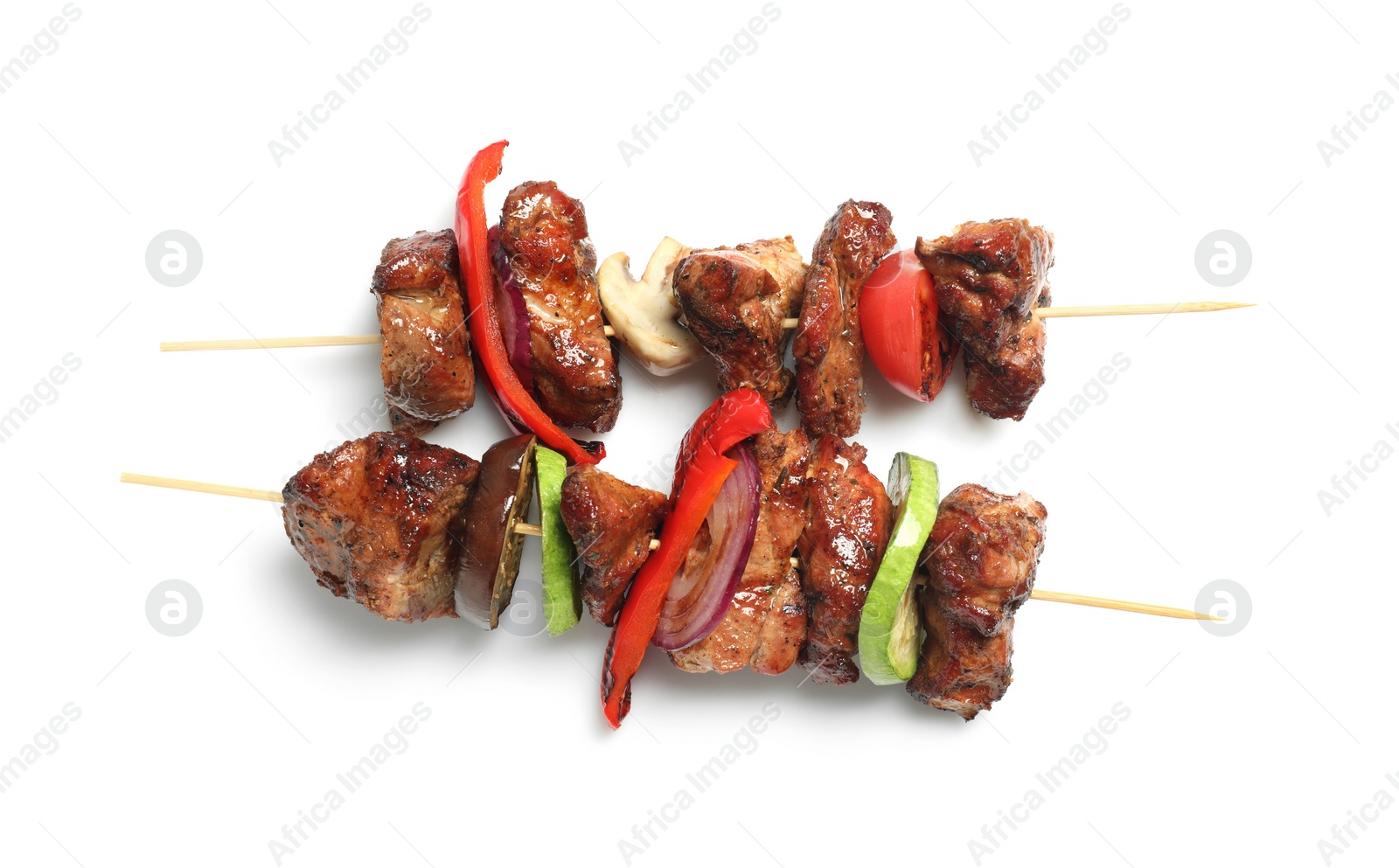 Photo of Delicious shish kebabs with vegetables isolated on white, top view