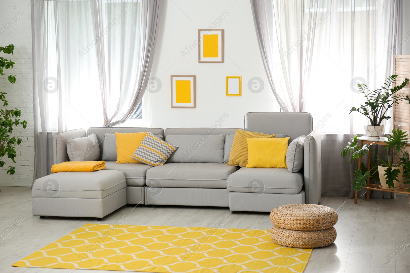 Photo of Living room with comfortable sofa and stylish decor. Idea for interior design