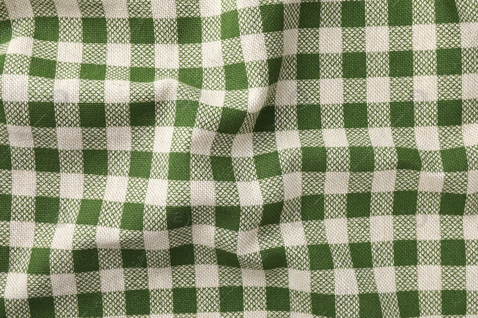 Photo of Texture of checkered fabric as background, top view