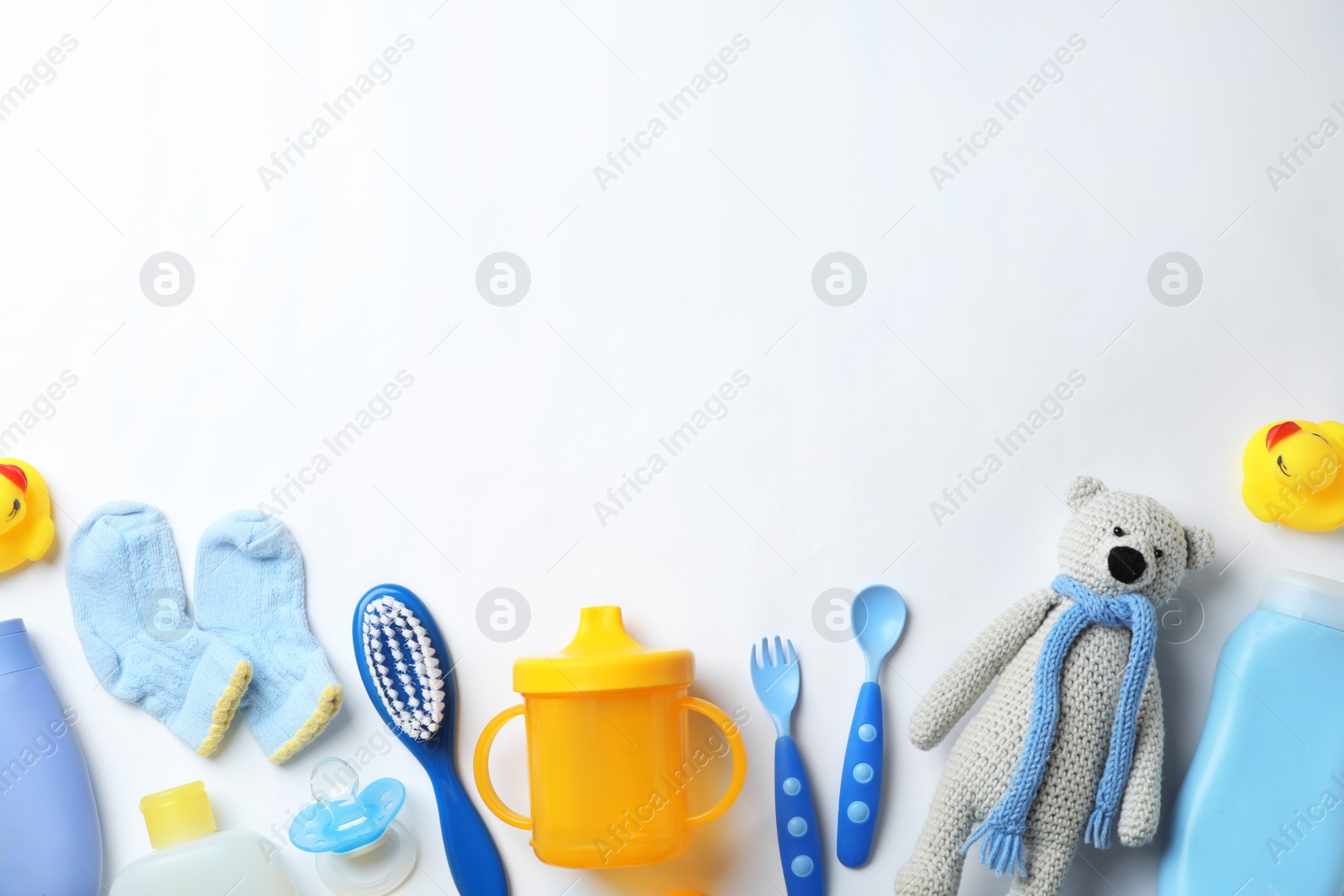 Photo of Flat lay composition with baby accessories and space for text on white background