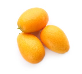 Photo of Fresh ripe kumquats on white background, top view. Exotic fruit