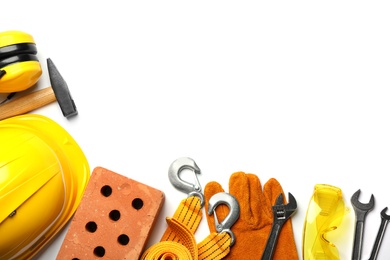 Photo of Composition with different construction tools on white background, top view. Space for text