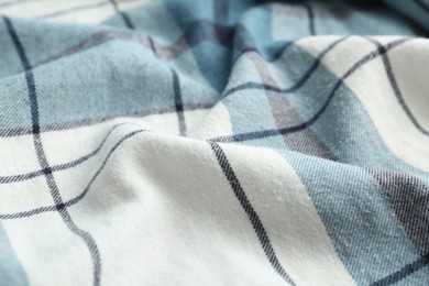 Photo of Texture of blue checkered fabric as background, closeup