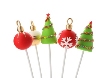 Photo of Delicious Christmas themed cake pops isolated on white