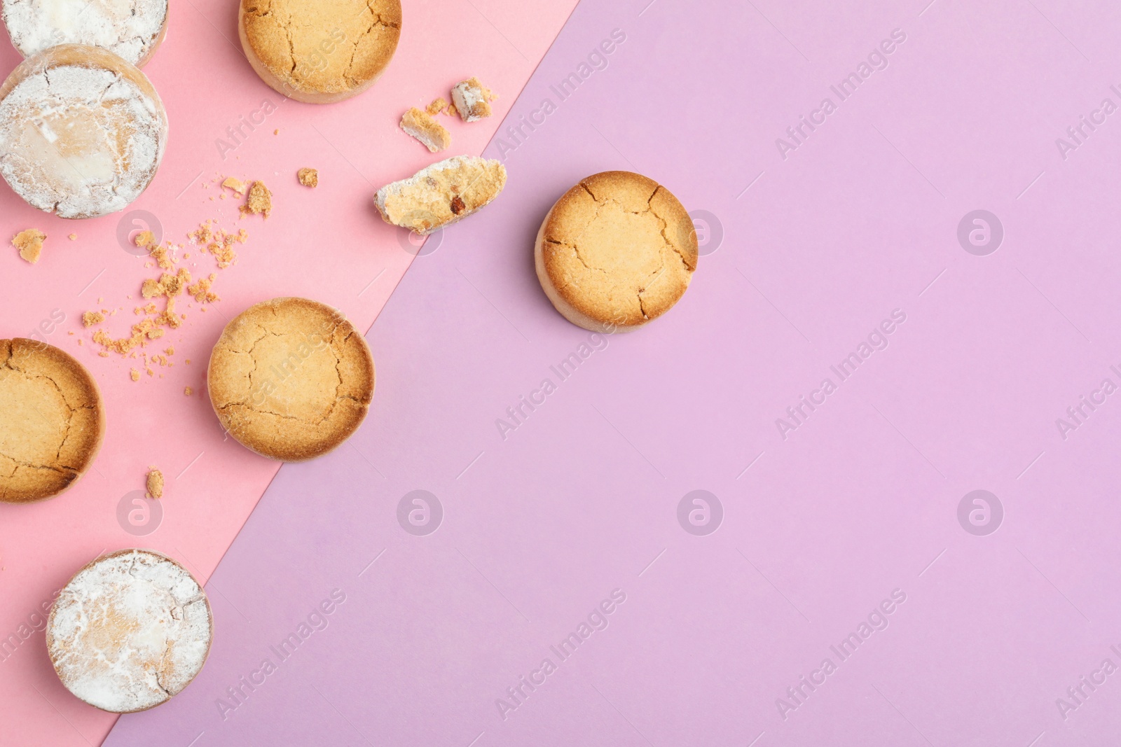 Photo of Delicious cookies on color background, flat lay. Space for text