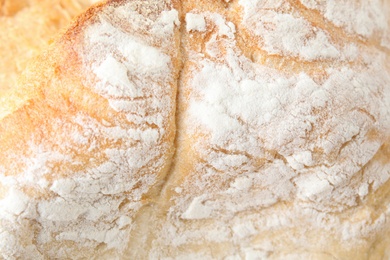 Photo of Closeup view of tasty white bread as background