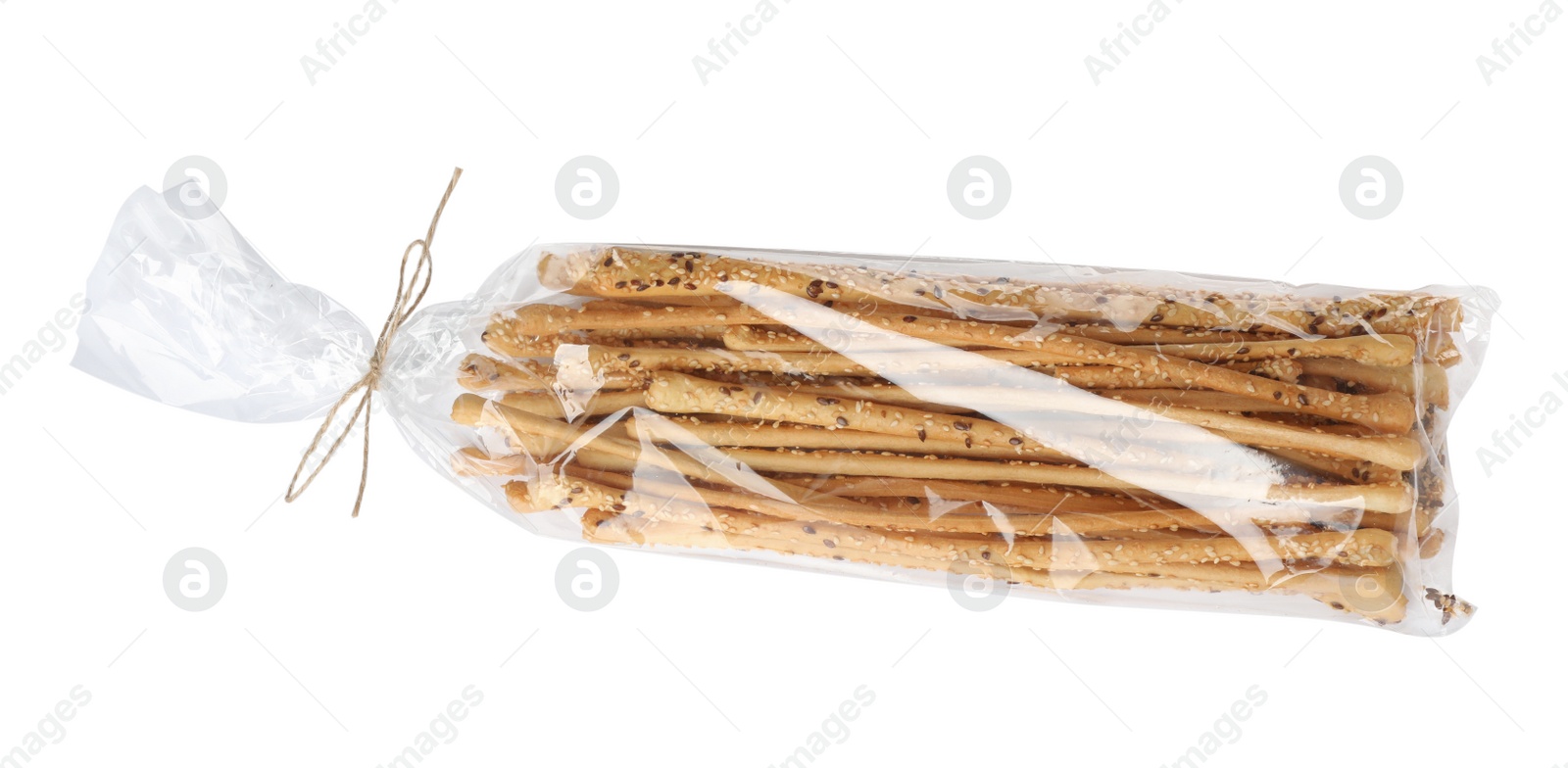 Photo of Fresh delicious grissini sticks on white background, top view