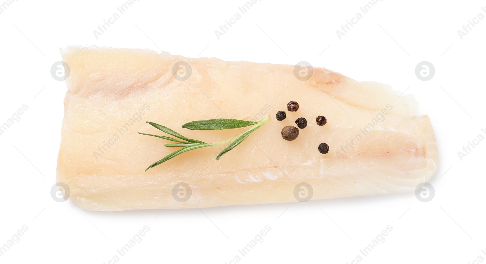 Photo of Piece of raw cod fish, rosemary and peppercorns isolated on white, above view