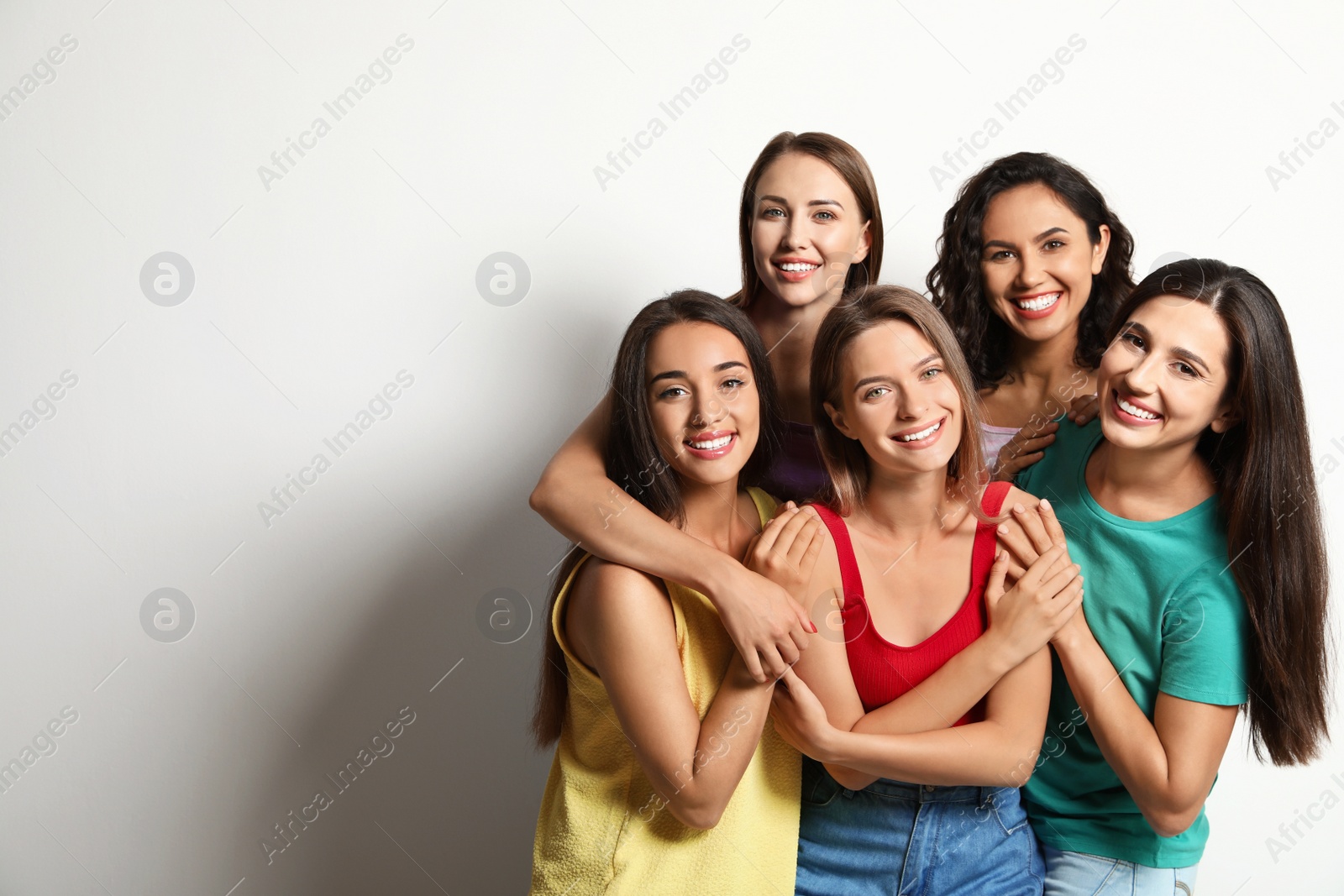 Photo of Happy women on white background, space for text. Girl power concept