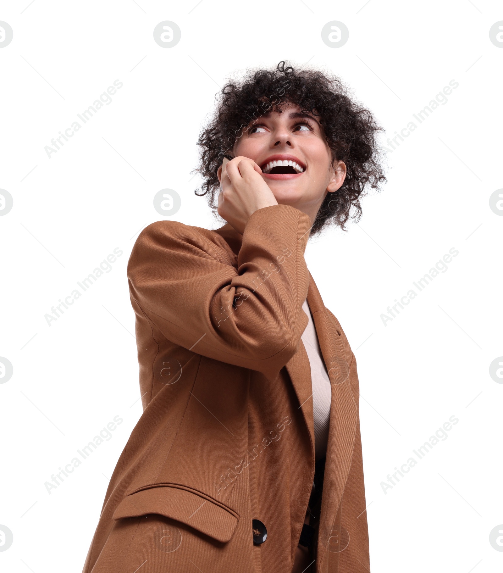 Photo of Beautiful happy businesswoman talking on white background, low angle view