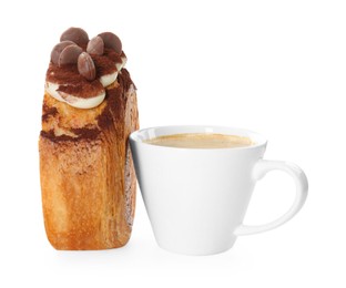 Photo of Round croissant with chocolate chips and cup of coffee isolated on white. Tasty puff pastry