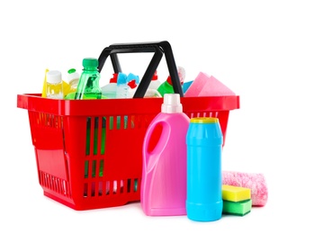 Photo of Shopping basket full of detergents on white background