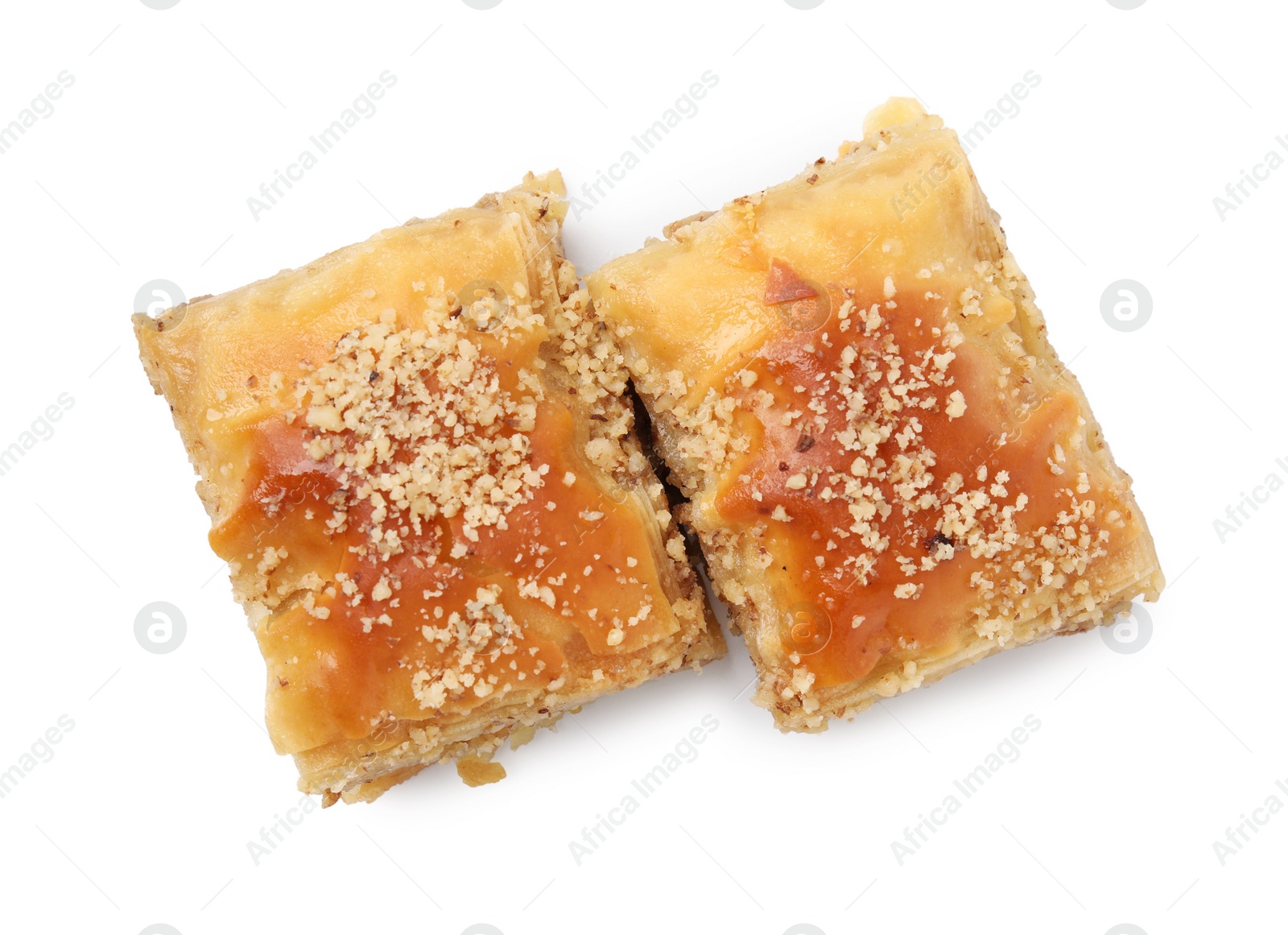 Photo of Eastern sweets. Pieces of tasty baklava isolated on white, top view