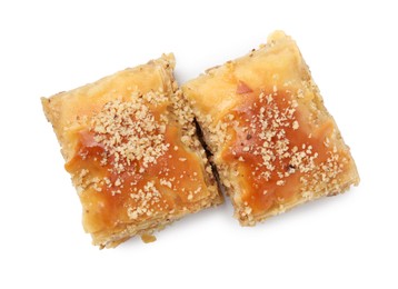 Photo of Eastern sweets. Pieces of tasty baklava isolated on white, top view