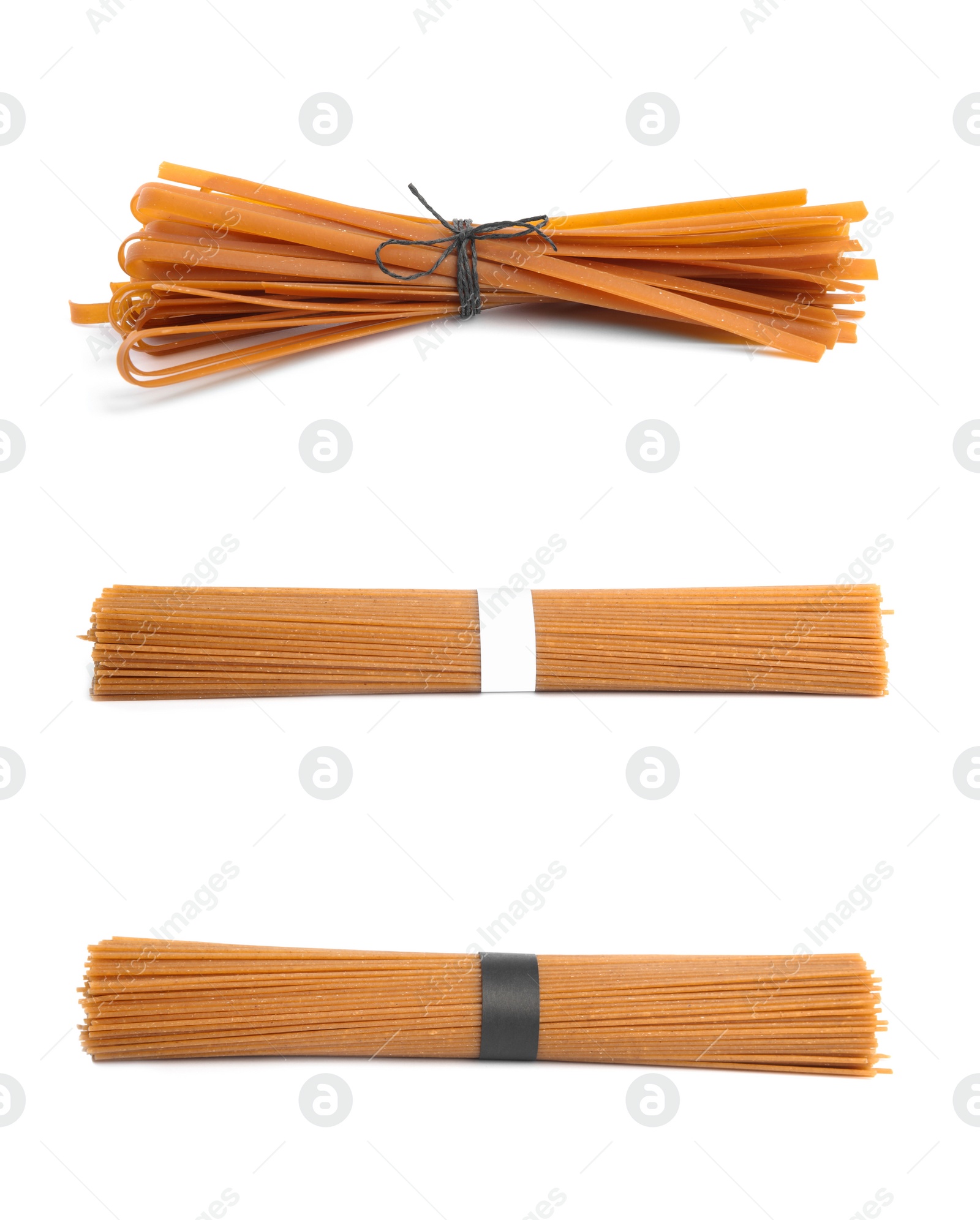 Image of Set with uncooked buckwheat noodles on white background