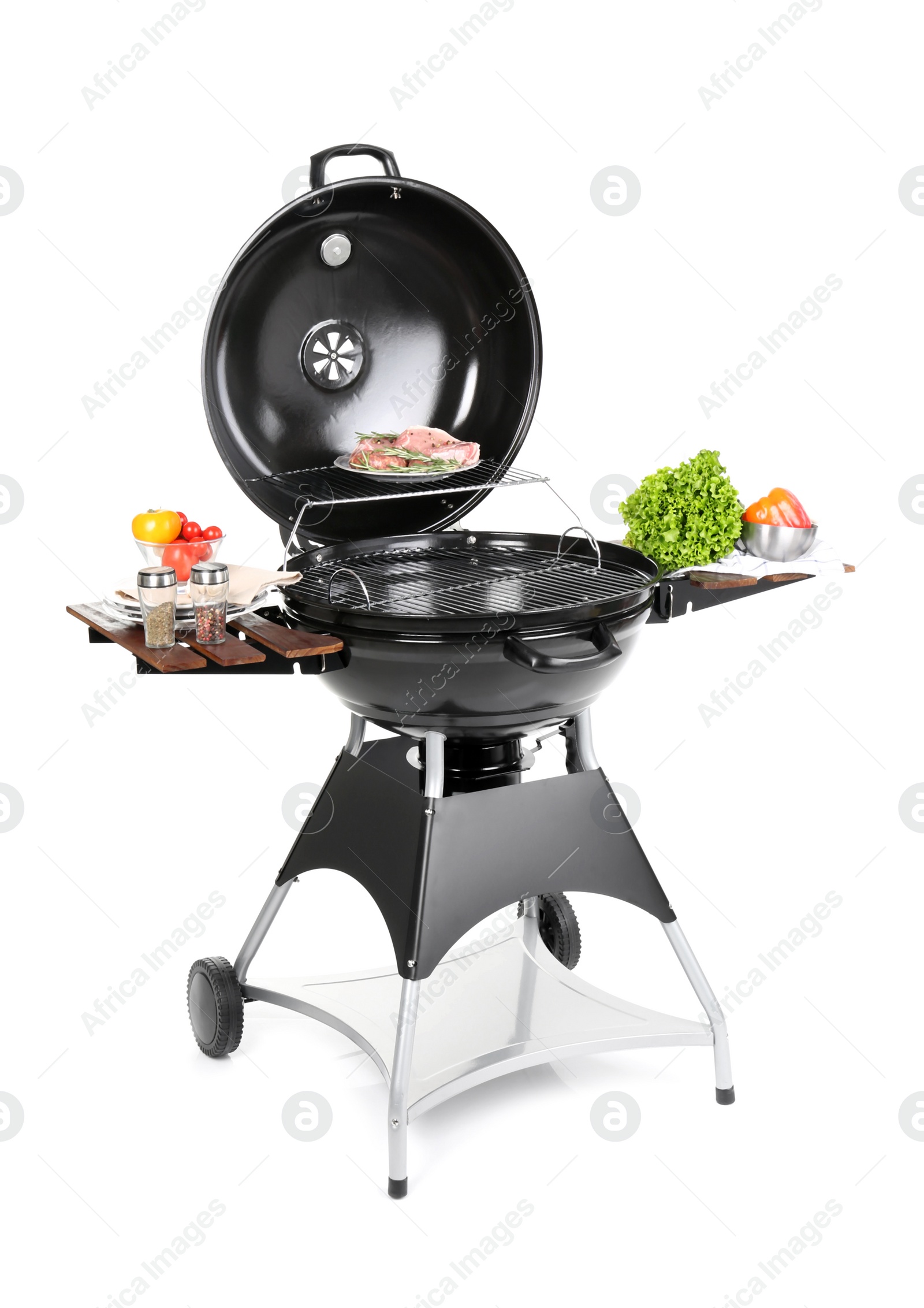 Photo of Modern barbecue grill with tasty food on white background