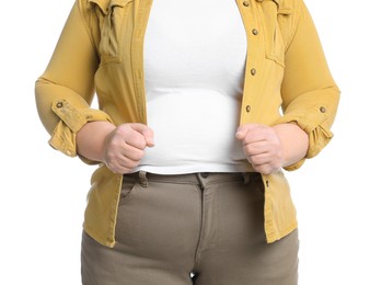 Photo of Overweight woman in tight clothes on white background, closeup