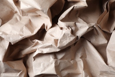 Photo of Crumpled waste paper as background, top view