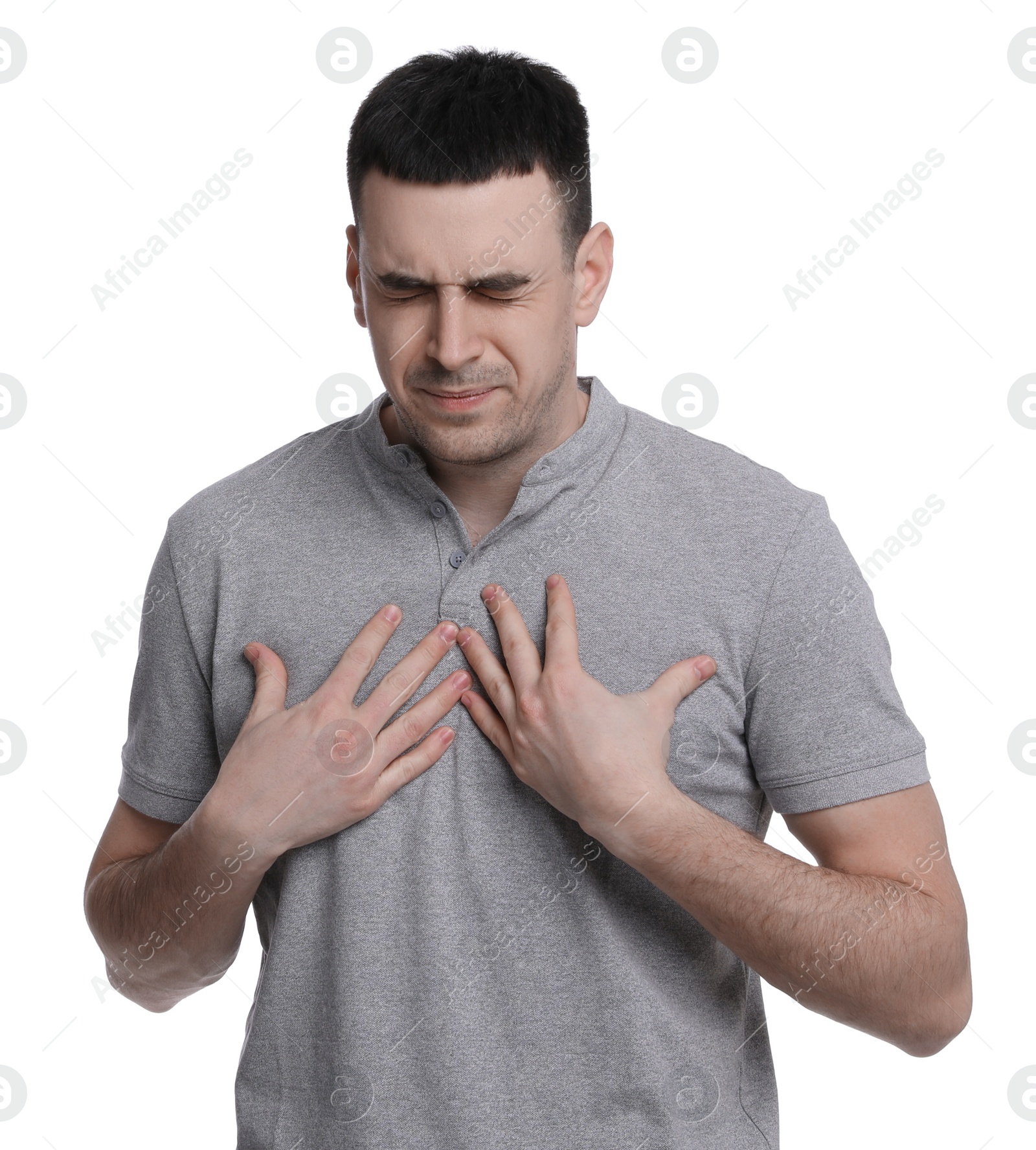 Photo of Young man suffering from cold on white background