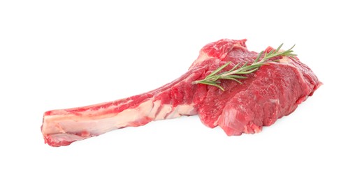 Photo of Raw ribeye steak and rosemary isolated on white