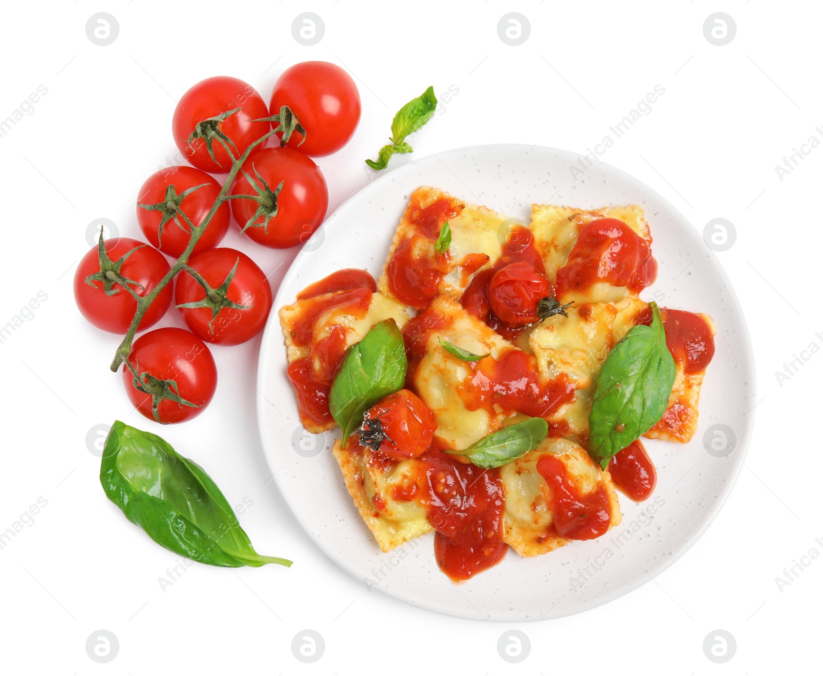 Photo of Tasty ravioli and tomatoes on white background, top view