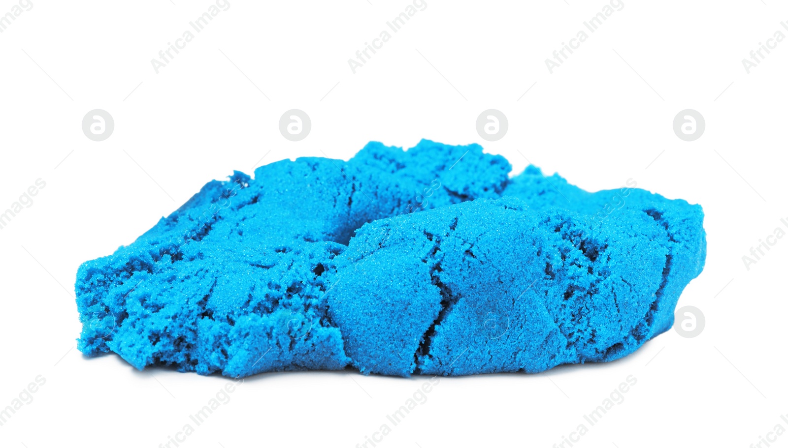 Photo of Pile of blue kinetic sand on white background