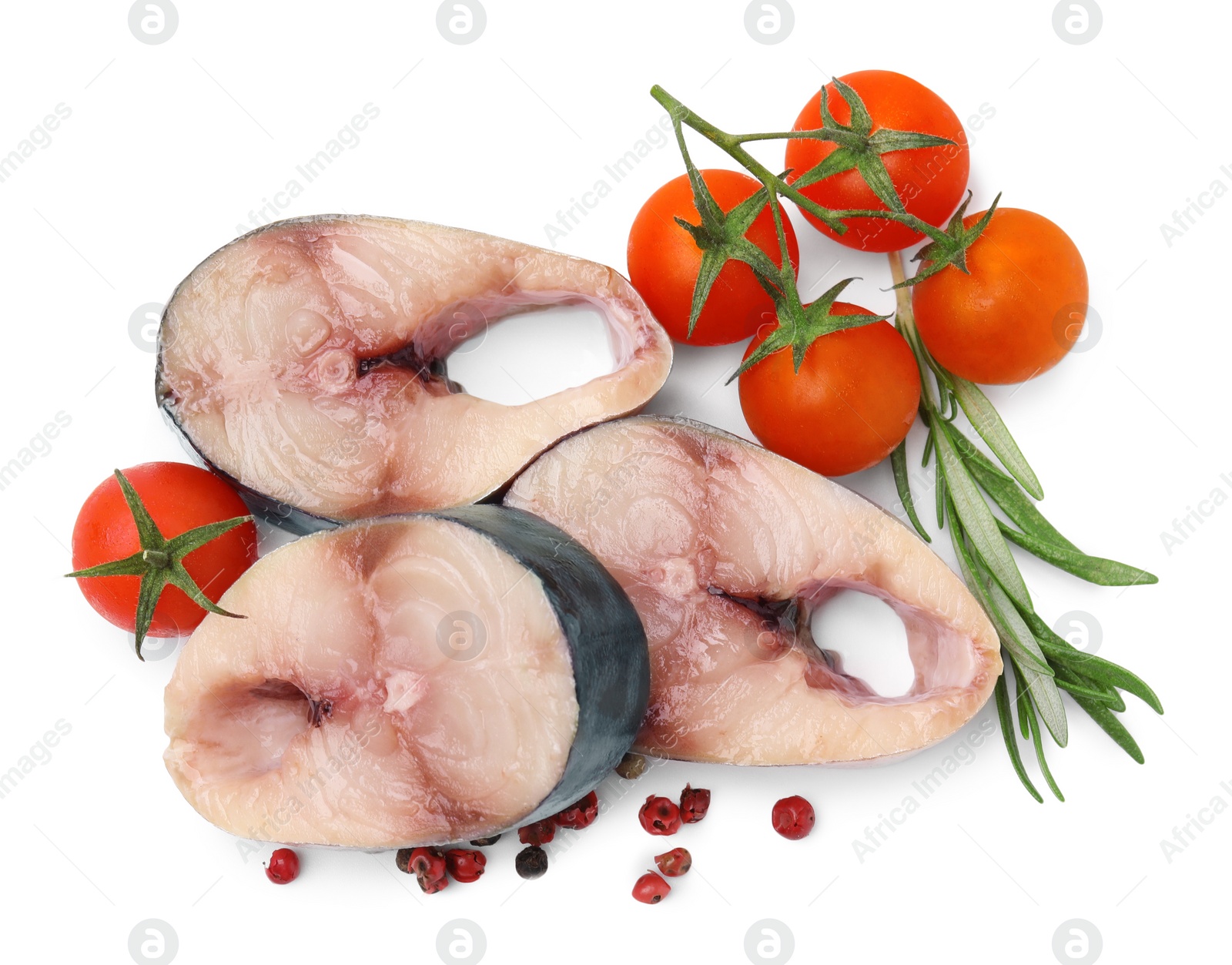 Photo of Pieces of mackerel fish with cherry tomatoes, rosemary and spices on white background, top view