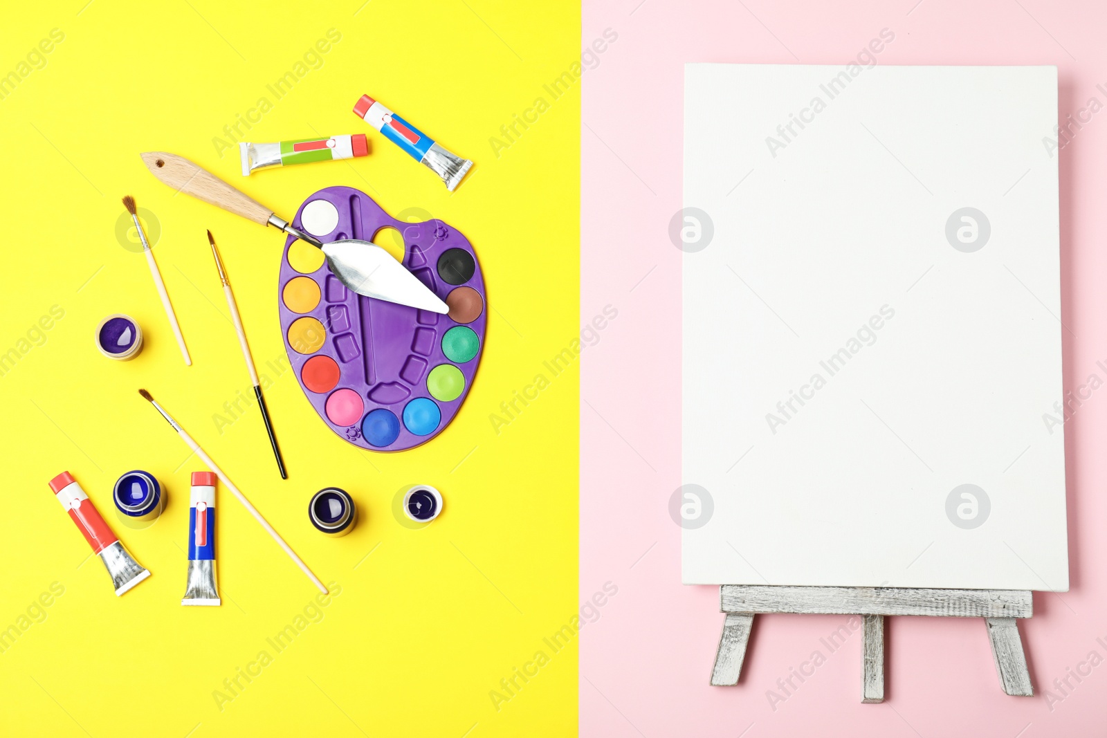 Photo of Flat lay composition with set of painting tools for children on color background