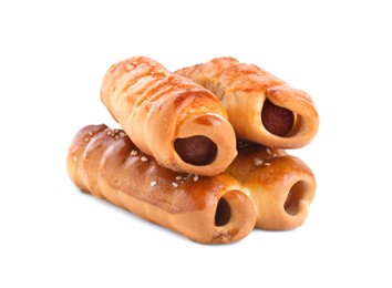 Photo of Many delicious sausage rolls isolated on white