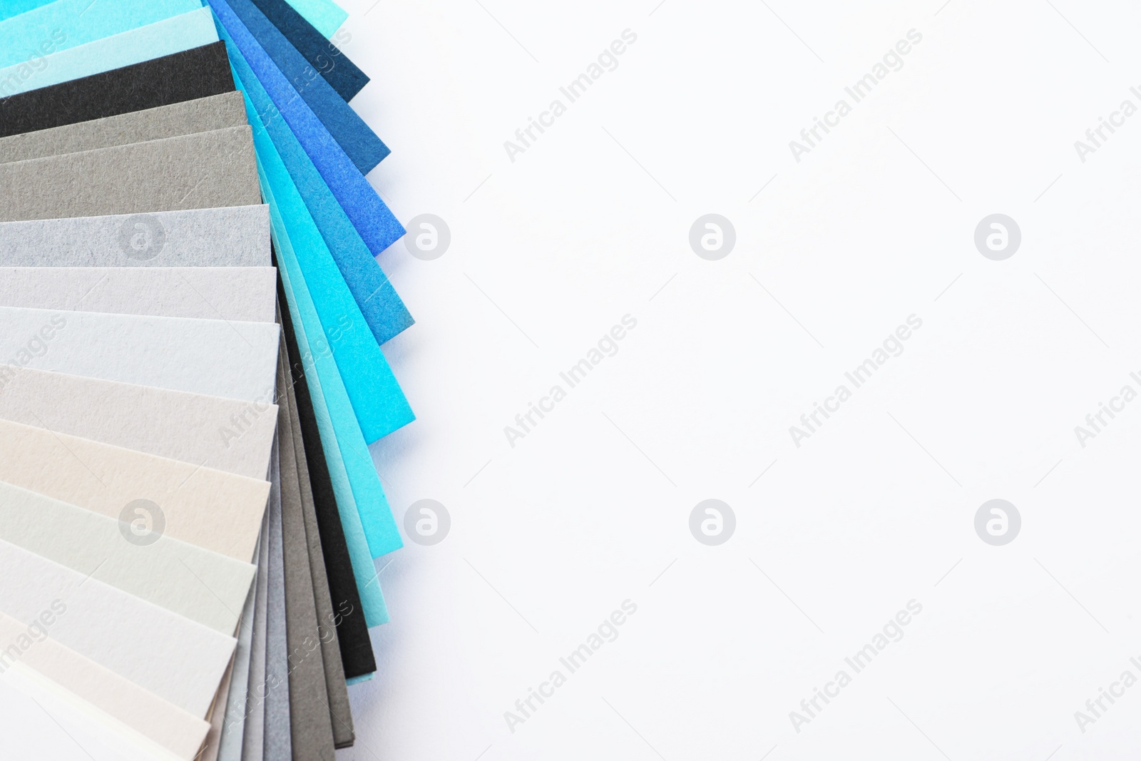 Photo of Color palette samples on white background top view