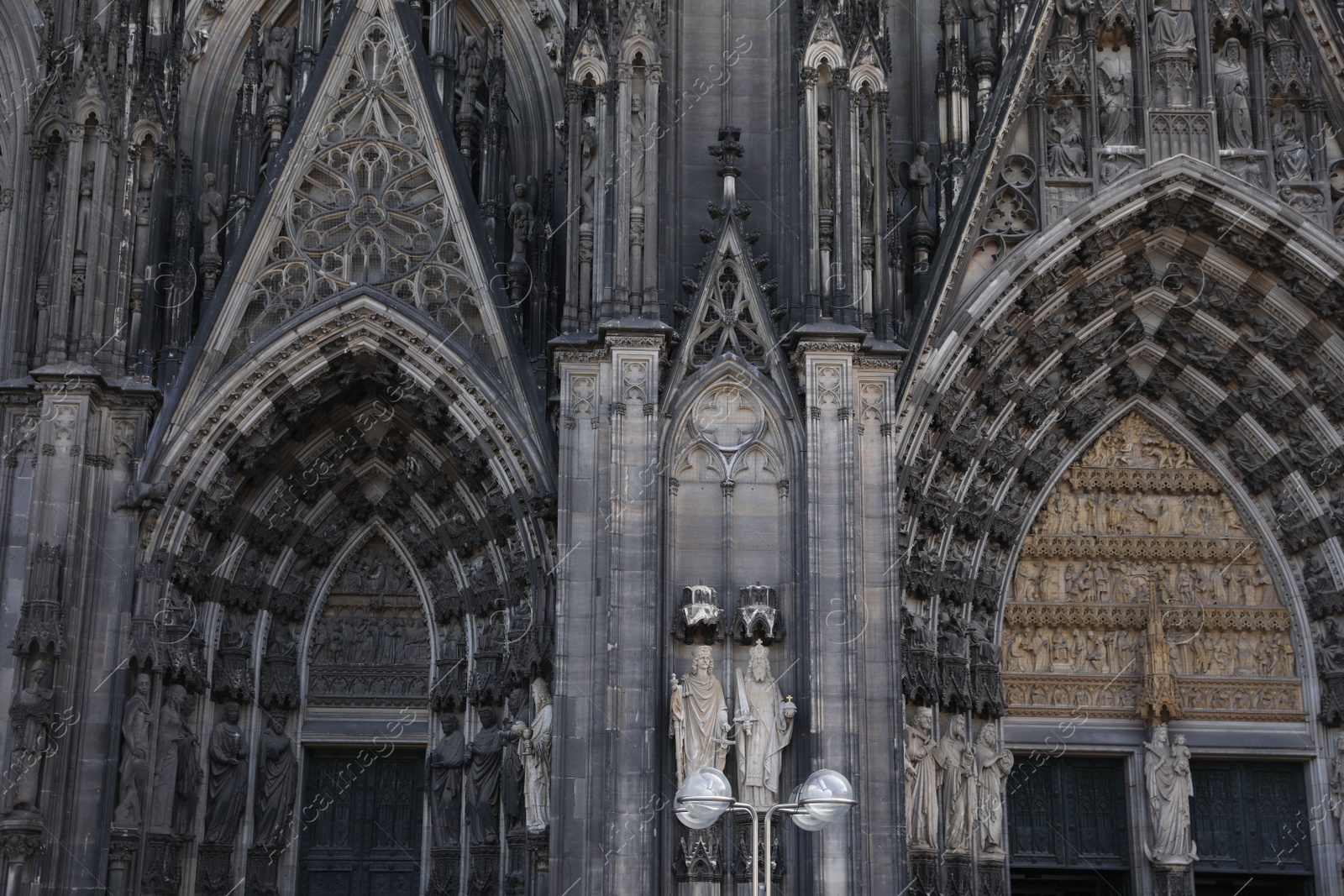 Photo of Cologne, Germany - August 28, 2022: Entrance of beautiful gothic cathedral outdoors