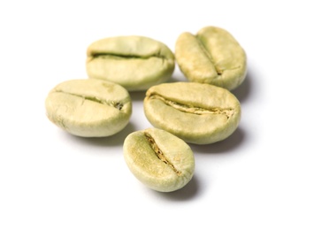 Photo of Green coffee beans on white background, closeup