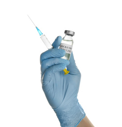 Doctor holding chickenpox vaccine and syringe on white background, closeup. Varicella virus prevention