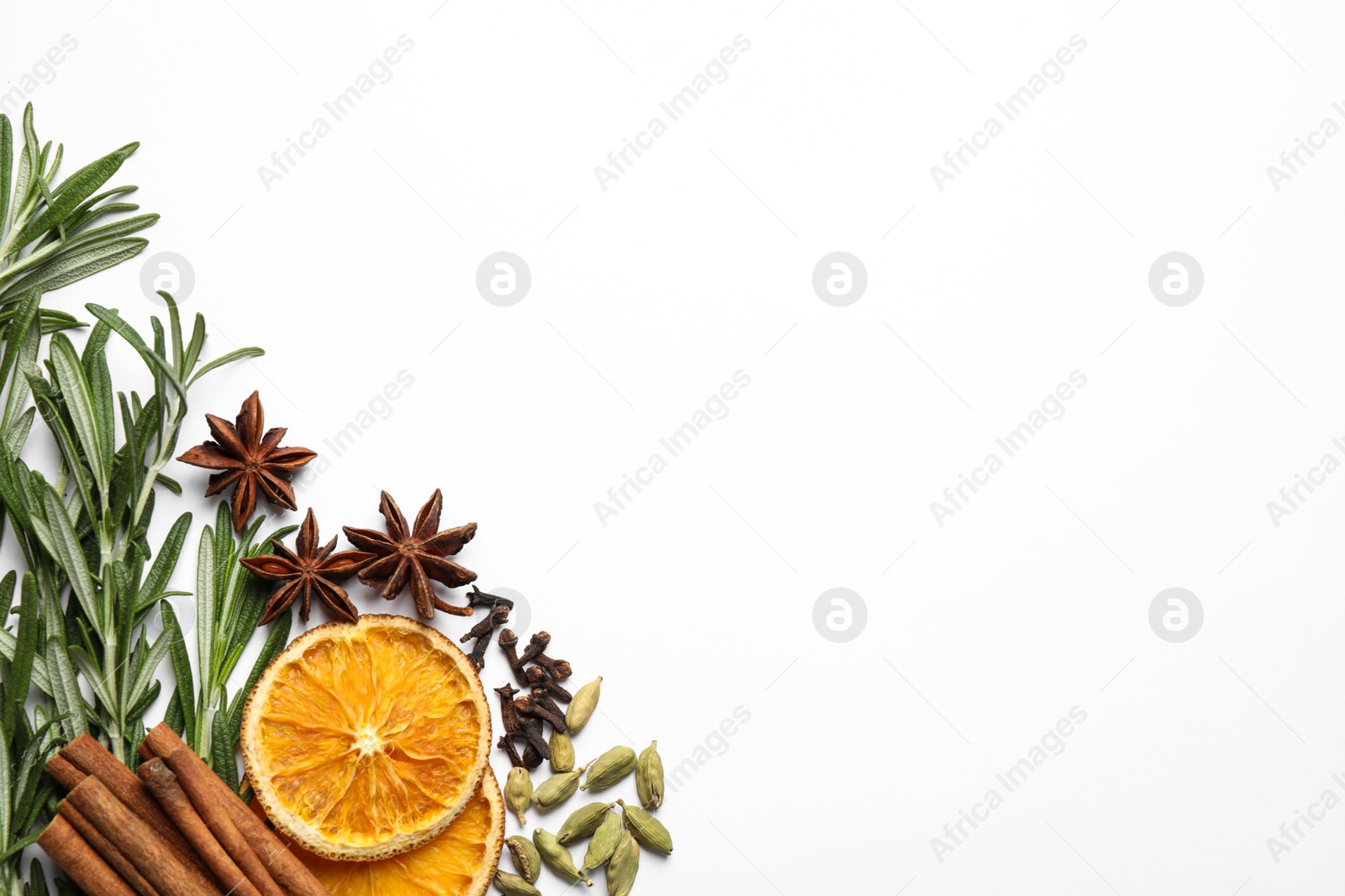 Photo of Different mulled wine ingredients on white background, flat lay. Space for text