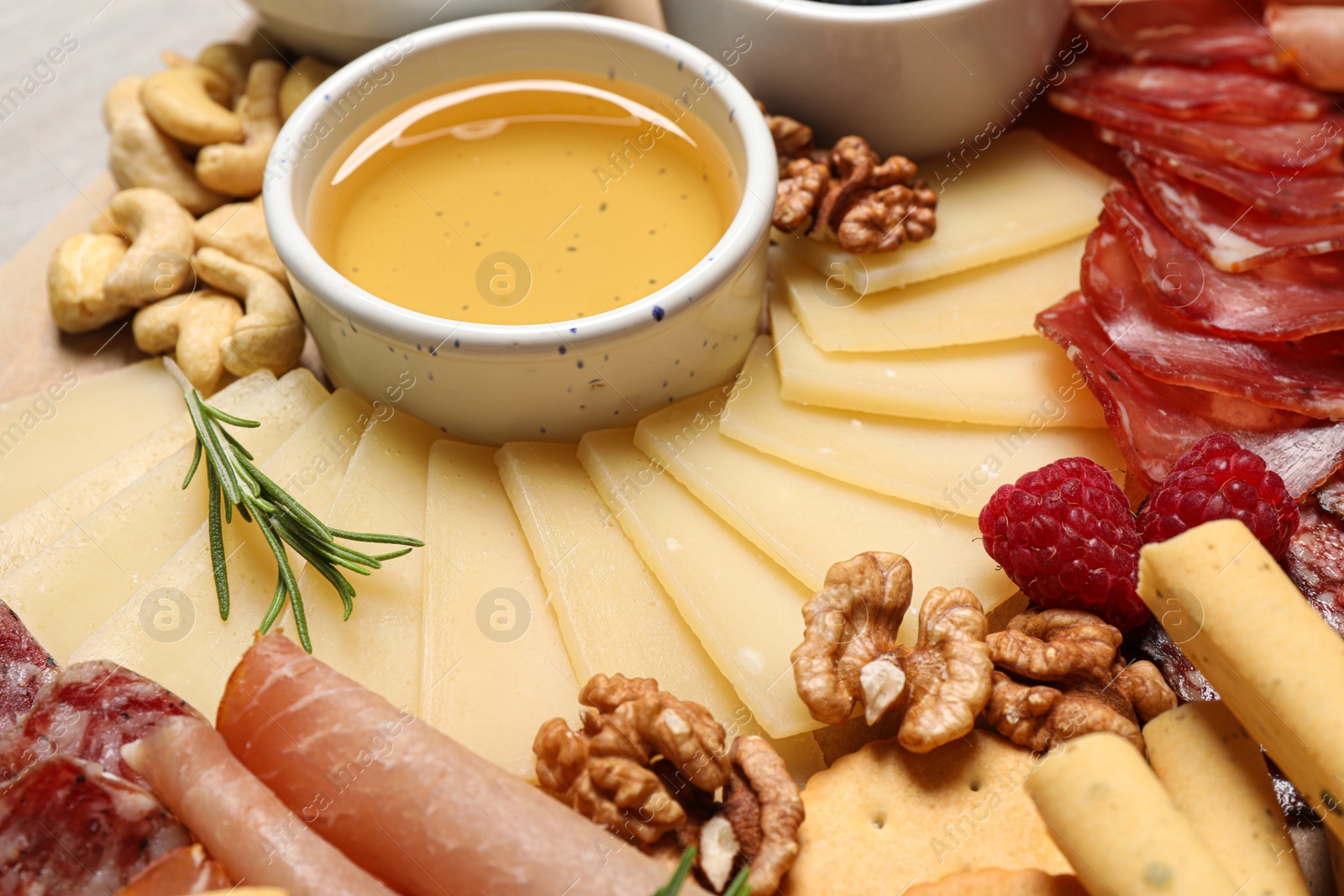 Photo of Many different appetizers and tasty parmesan cheese on table, closeup