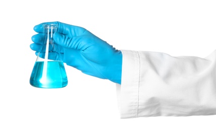 Photo of Scientist holding glass flask with liquid on white background. Chemical research