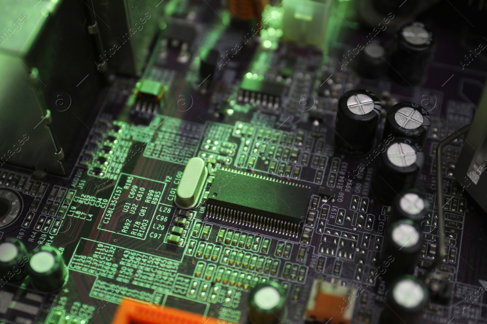 Photo of Computer motherboard as background, closeup. Electronic device