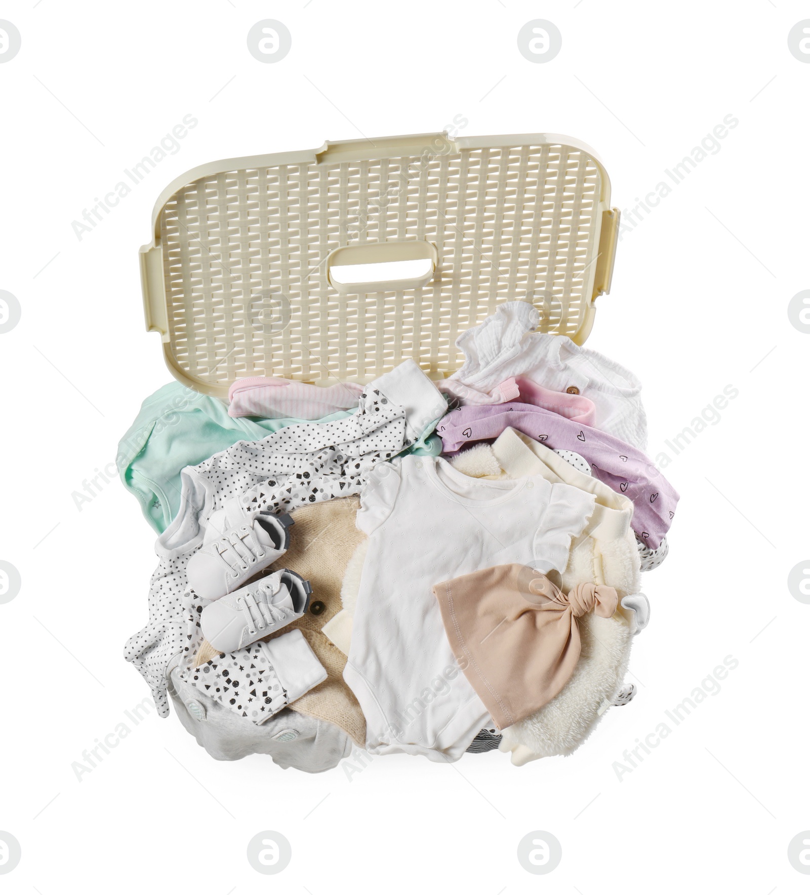 Photo of Laundry basket with baby clothes and shoes isolated on white, top view