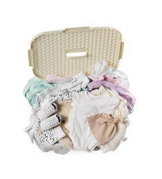 Photo of Laundry basket with baby clothes and shoes isolated on white, top view