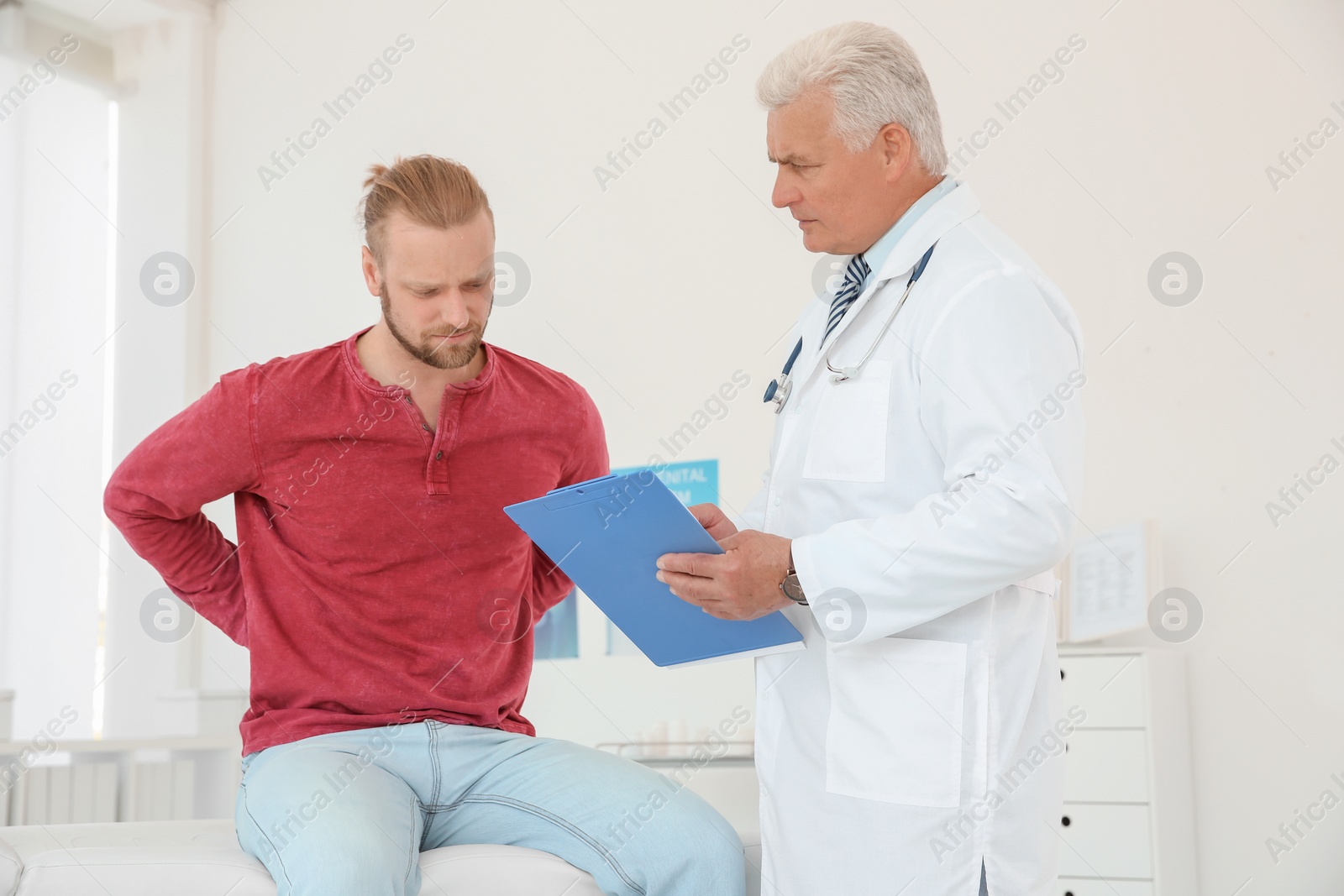 Photo of Man with health problems visiting urologist at hospital