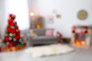 Photo of Blurred view of room with beautiful Christmas tree