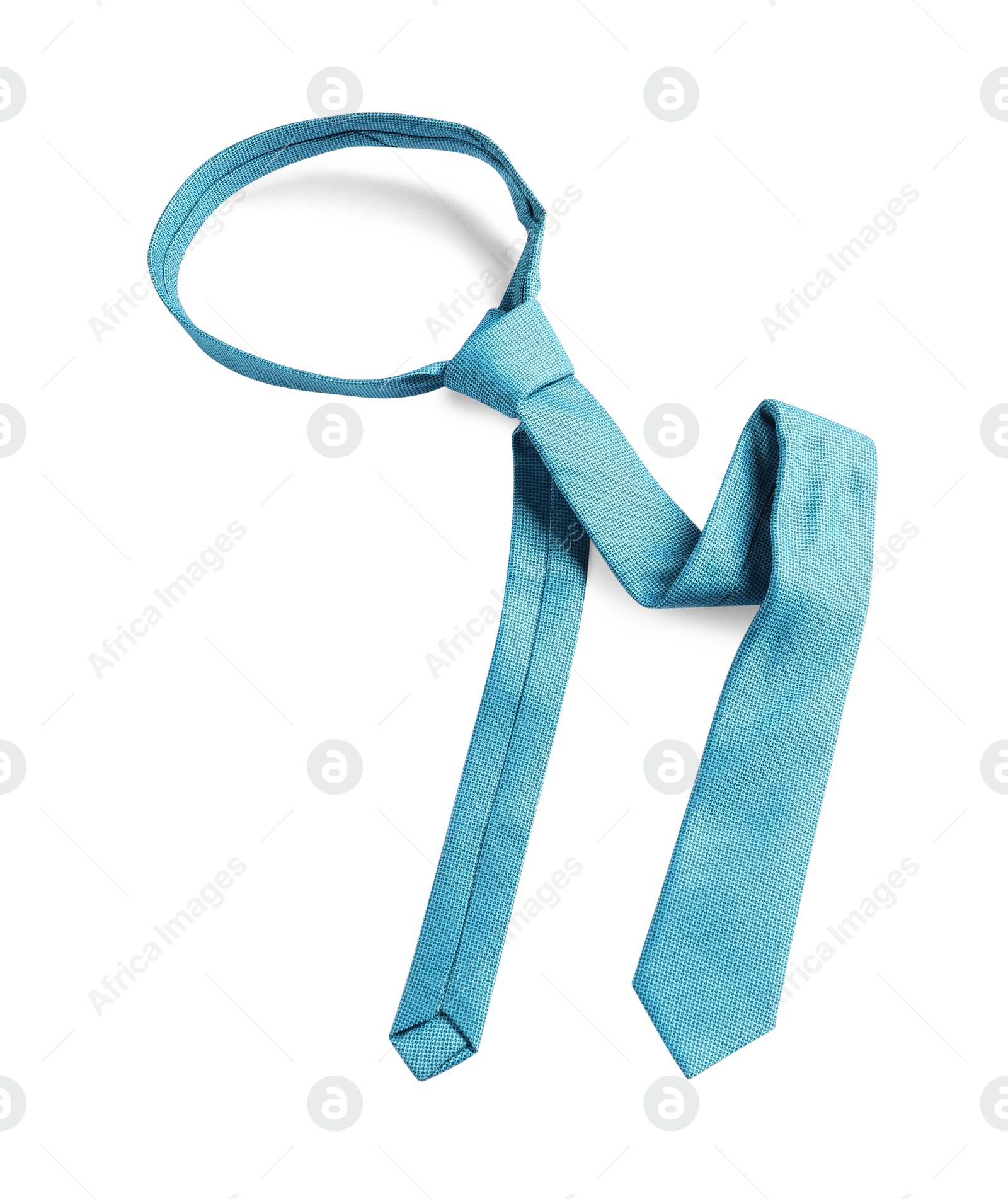 Photo of One light blue necktie isolated on white, above view