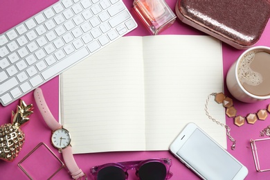 Photo of Flat lay composition with empty notebook, keyboard and accessories on color background. Fashion blogger
