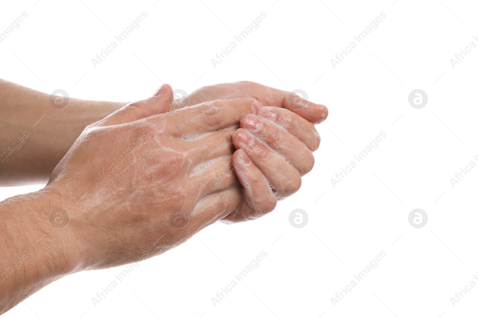 Photo of Man washing hands with soap on white background, closeup