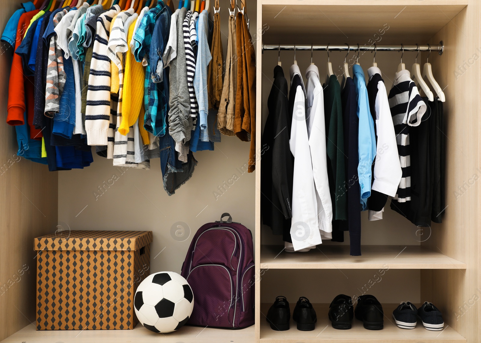 Photo of Large wardrobe with teenager clothes, shoes and accessories