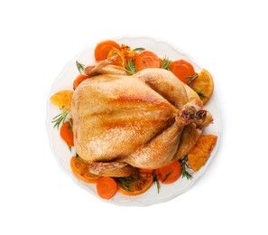 Photo of Roasted chicken with oranges and carrot isolated on white, top view